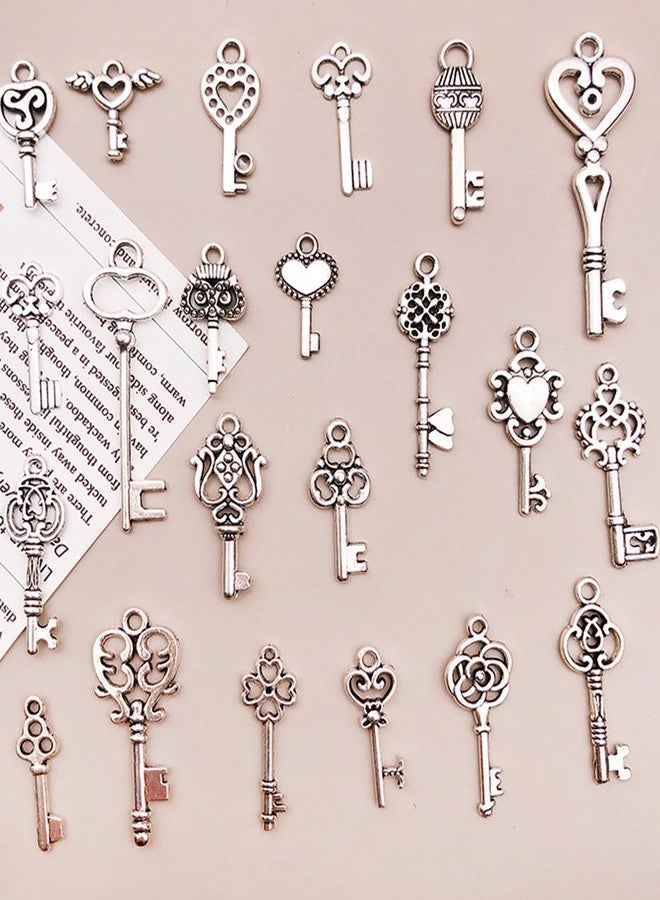 BdelrinQue 31Pcs Silver Small Old Keys, Unique Key Pendant for Necklace and Keychain, Vintage Jewelry Key Charm for DIY Crafts, Assorted Key Shapes Like Heart and Clover, Perfect for Personalized Gifts - Image 4